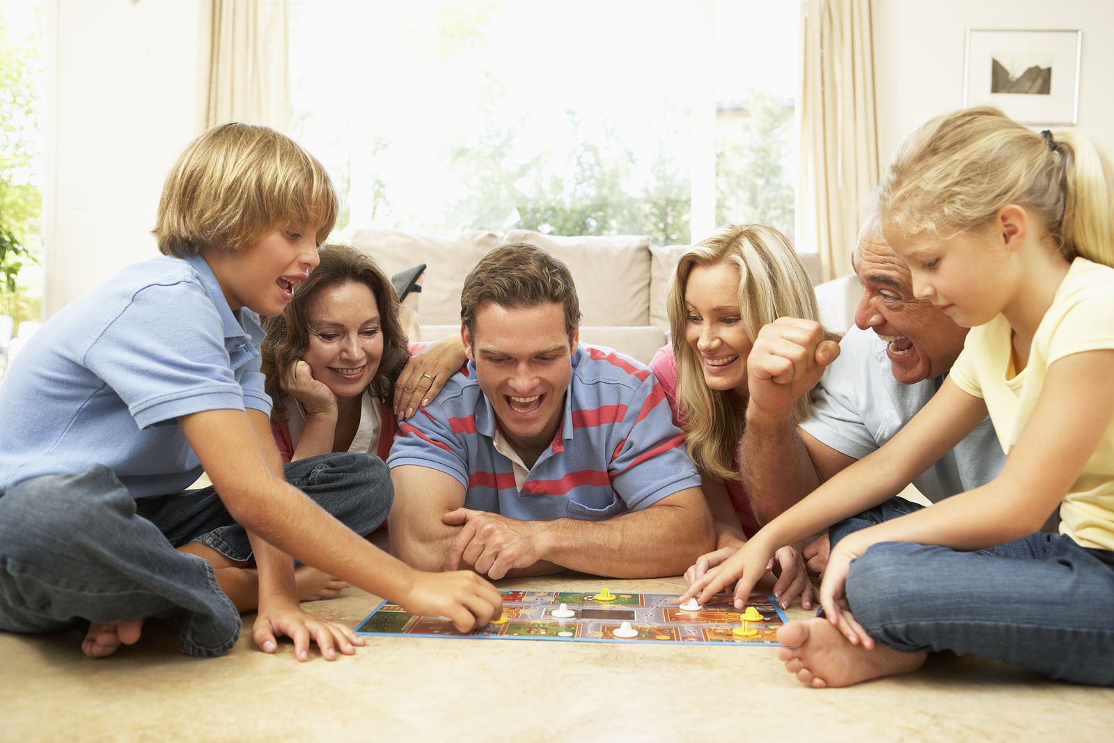 Family playing a card game together